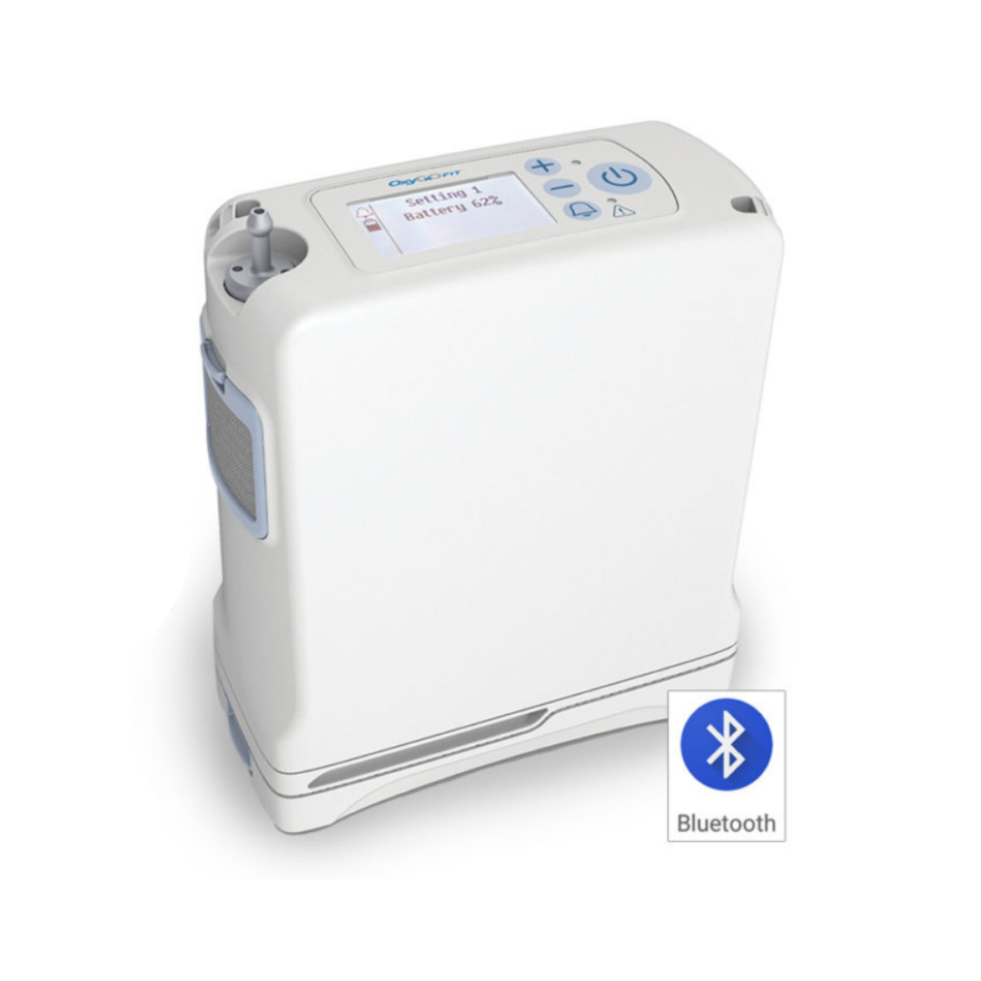 The OxyGo FIT Compact Portable Oxygen Concentrator is lightweight and features a digital display for settings and battery life, along with a Bluetooth icon to show wireless connectivity.